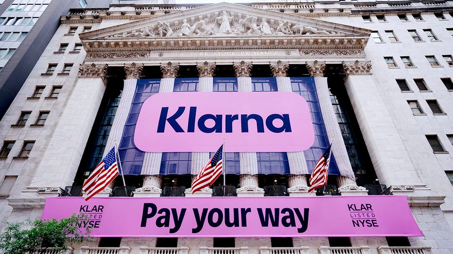 A Klarna sign on the front of the New York Stock Exchange