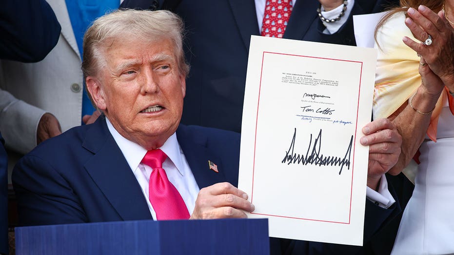 U.S. President Donald Trump signs the One, Big Beautiful Bill Act into law on the South Lawn of the White House on July 04, 2025.